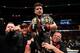 CHICAGO, IL - JUNE 08: Henry Cejudo celebrates his TKO victory over Marlon Moraes of Brazil in their bantamweight championship bout during the UFC 238 event at the United Center on June 8, 2019 in Chicago, Illinois. (Photo by Jeff Bottari/Zuffa LLC/Zuffa