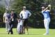 PEBBLE BEACH, CALIFORNIA - JUNE 11: Dustin Johnson of the United States (R) plays a shot as player instructor, Butch Harmon, and caddie, Austin Johnson, look on during a practice round prior to the 2019 U.S. Open at Pebble Beach Golf Links on June 11, 201
