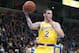 SAN JOSE, CA - OCTOBER 12: Lonzo Ball #2 of the Los Angeles Lakers looks to pass the ball against the Golden State Warriors during the first half of their NBA basketball game at SAP Center on October 12, 2018 in San Jose, California. NOTE TO USER: User e