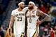 NEW ORLEANS, LA - JANUARY 22: Anthony Davis #23 of the New Orleans Pelicans and DeMarcus Cousins #0 of the New Orleans Pelicans walk of the court during a NBA game against the Chicago Bulls at the Smoothie King Center on January 22, 2018 in New Orleans,