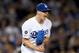 LOS ANGELES, CALIFORNIA - JUNE 21: Walker Buehler #21 of the Los Angeles Dodgers celebrates a strikeout of Nolan Arenado #28 of the Colorado Rockies to end the top of the ninth inning at Dodger Stadium on June 21, 2019 in Los Angeles, California. (Photo