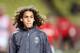 French player Hannibal Mejbri looks on, prior to the French L1 football match between Monaco and Angers at the