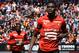 Rennes' Senegalese midfielder Ismaila Sarr (R) reacts after scoring during the French Ligue 1 football match between Stade Rennais FC and Guingamp EAG at the Roazhon Park stadium in the northwestern French city of Rennes, on May 12, 2019. (Photo by DAMIEN