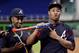Ronald Acuna Jr. (right) signed a deal with the Braves this past April that could keep him in Atlanta through the 2028 season.