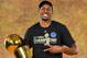 OAKLAND, CA - JUNE 12: Andre Iguodala of the Golden State Warriors poses for a portrait with the Larry O'Brien Trophy after defeating the Cleveland Cavaliers in Game Five of the 2017 NBA Finals on June 12, 2017 at ORACLE Arena in Oakland, California. NOTE