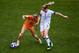 LYON, FRANCE - JULY 07: Jackie Groenen (L) of Netherlands competes for the ball with Samantha Mewis of the USA during the 2019 FIFA Women's World Cup France Final match between The United StateS of America and The Netherlands at Stade de Lyon on July 7, 2