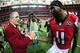 ATLANTA, GA - DECEMBER 27: Julio Jones #11 of the Atlanta Falcons shakes hands with team owner Arthur Blank after beating the Carolina Panthers at the Georgia Dome on December 27, 2015 in Atlanta, Georgia. (Photo by Scott Cunningham/Getty Images)