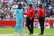 BIRMINGHAM, ENGLAND - JULY 11: Jason Roy of England reacts after being given out caught behind despite not connecting with the ball, as Umpires, Marais Erasmus and Kumar Dharmasena usher him from the field during the Semi-Final match of the ICC Cricket W