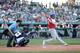 The "robo umpire" system utilizes a network of calibrated lasers that adjust to each hitter's unique strike zone based on their size.