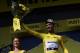 France's Julian Alaphilippe (R) celebrates his overall leader's yellow jersey on the podium of the eighth stage of the 106th edition of the Tour de France cycling race between Macon and Saint-Etienne, in Saint-Etienne, eastern France, on July 13, 2019. (P