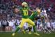 SANTA CLARA, CA - DECEMBER 31: Justin Herbert #10 of the Oregon Ducks looks to pass against the Michigan State Spartans during the second half of the Redbox Bowl at Levi's Stadium on December 31, 2018 in Santa Clara, California. (Photo by Thearon W. Hen