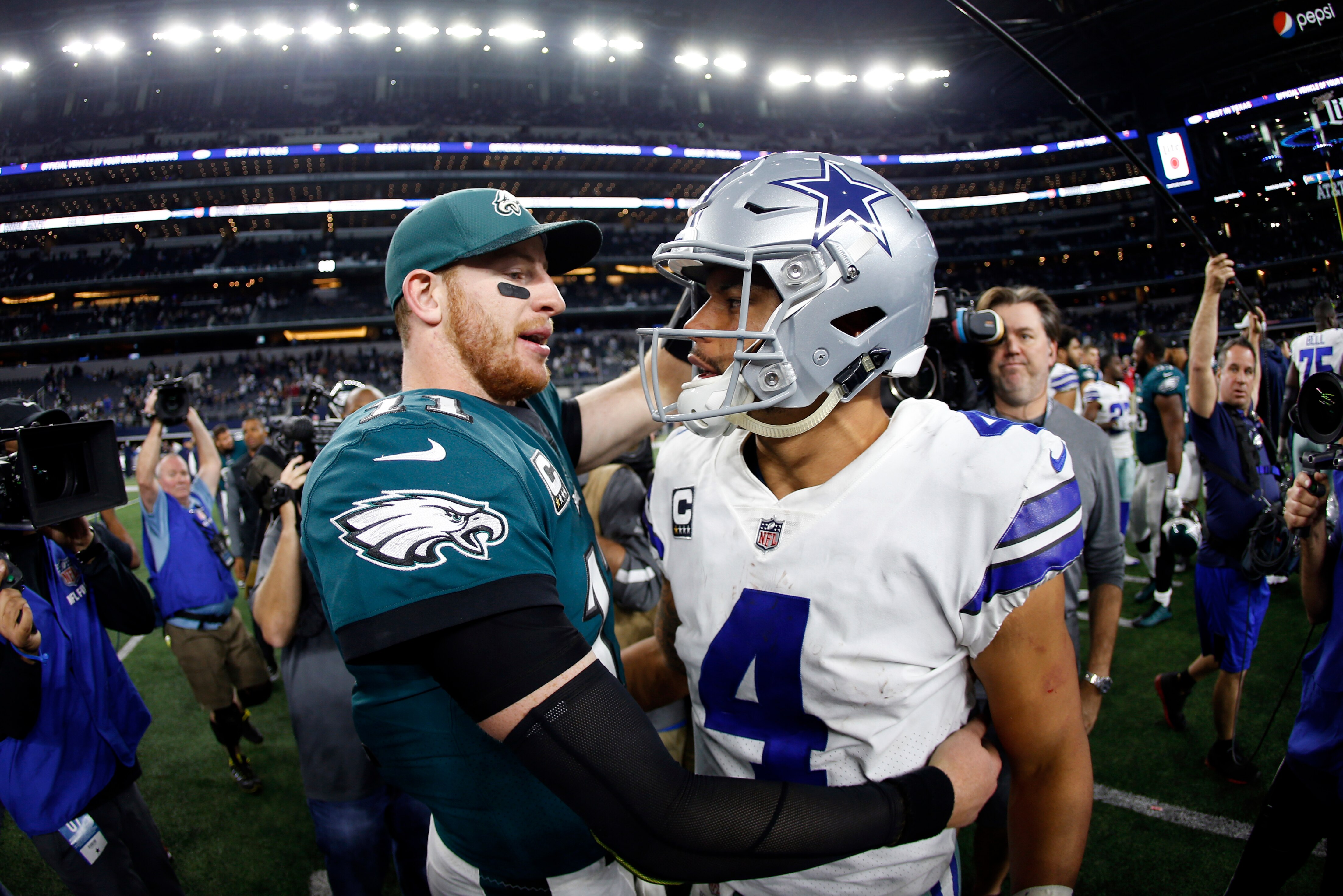 Carson Wentz and Dak Prescott are part of a young class of quarterbacks who have found success with a variety of playing styles.