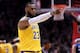 LOS ANGELES, CALIFORNIA - JANUARY 31: LeBron James #23 of the Los Angeles Lakers reacts to a basket from Lance Stephenson #6 during a 123-120 win over the LA Clippers at Staples Center on January 31, 2019 in Los Angeles, California. NOTE TO USER: User e