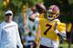 RICHMOND, VA - JULY 26: Dwayne Haskins #7 of the Washington Redskins attempts a pass as quarterbacks coach Tim Rattay looks on during training camp at Bon Secours Washington Redskins Training Center on July 26, 2019 in Richmond, Virginia. (Photo by Scott