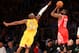 LOS ANGELES, CA - OCTOBER 28: James Harden #13 of the Houston Rockets shoots over Kobe Bryant #24 of the Los Angeles Lakers at Staples Center on October 28, 2014 in Los Angeles, California. NOTE TO USER: User expressly acknowledges and agrees that, by do