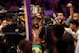 WWE Superstar Kofi Kingston is surrounded by fans at the end of the World Wrestling Entertainment (WWE) Super Showdown event in Saudi Arabia's Red Sea port city of Jeddah late on January 7, 2019. (Photo by Amer HILABI / AFP) (Photo credit should re