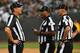 OAKLAND, CALIFORNIA - AUGUST 10: Back judge Todd Prukop #30, side judge Boris Cheek #41 and line judge Dana McKenzie #8 during their NFL preseason game at RingCentral Coliseum on August 10, 2019 in Oakland, California. (Photo by Robert Reiners/Getty Image