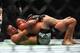 ANAHEIM, CALIFORNIA - AUGUST 17: Nate Diaz and Anthony Pettis fight from the ground in the first round during their Welterweight Bout at UFC 241 at Honda Center on August 17, 2019 in Anaheim, California. (Photo by Joe Scarnici/Getty Images)