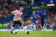 LONDON, ENGLAND - AUGUST 18: James Maddison of Leicester City holds off the challenge from NGolo Kante of Chelsea during the Premier League match between Chelsea FC and Leicester City at Stamford Bridge on August 18, 2019 in London, United Kingdom. (Photo
