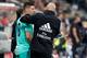 SALZBURG, AUSTRIA - AUGUST 07: Luka Jovic (Real Madrid) speaks with head coach Zinedine Zidane (Real Madrid) during the pre-season friendly match between RB Salzburg and Real Madrid at Red Bull Arena on August 07, 2019 in Salzburg, Austria. (Photo by TF-I