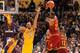 LOS ANGELES, CA - MARCH 10: LeBron James #23 of the Cleveland Cavaliers shoots the ball during the game against Kobe Bryant #24 of the Los Angeles Lakers on March 10, 2016 at STAPLES Center in Los Angeles, California. NOTE TO USER: User expressly acknowle