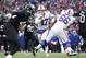 BUFFALO, NY - NOVEMBER 25: Josh Allen #17 of the Buffalo Bills rushes for a touchdown as he gets a block from Russell Bodine #66 in the fourth quarter during NFL game action against the Jacksonville Jaguars at New Era Field on November 25, 2018 in Buffalo