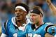 CHARLOTTE, NC - AUGUST 17: Cam Newton #1 and teammate Christian McCaffrey #22 of the Carolina Panthers react after a third quarter touchdown against the Miami Dolphins during the game at Bank of America Stadium on August 17, 2018 in Charlotte, North Caro