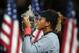 NEW YORK, NY - SEPTEMBER 08: Naomi Osaka of Japan poses with the championship trophy after winning the Women's Singles finals match against Serena Williams of the United States on Day Thirteen of the 2018 US Open at the USTA Billie Jean King National Ten