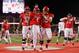 HOUSTON, TX - NOVEMBER 10: D'Eriq King #4 of the Houston Cougars is congratulated by Will Noble #69 and Jarrid Williams #62 after a touchdown in the third quarter against the Temple Owls at TDECU Stadium on November 10, 2018 in Houston, Texas. (Photo by