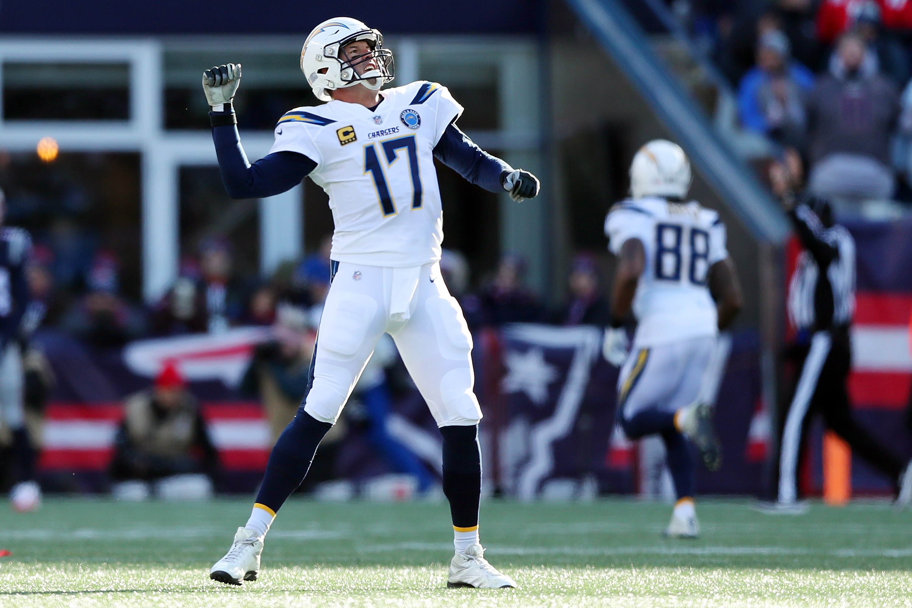 FOXBOROUGH, MASSACHUSETTS - JANUARY 13: Philip Rivers #17 of the Los Angeles Chargers reacts during the AFC Divisional Playoff Game against the New England Patriots at Gillette Stadium on January 13, 2019 in Foxborough, Massachusetts. (Photo by Adam Glanz