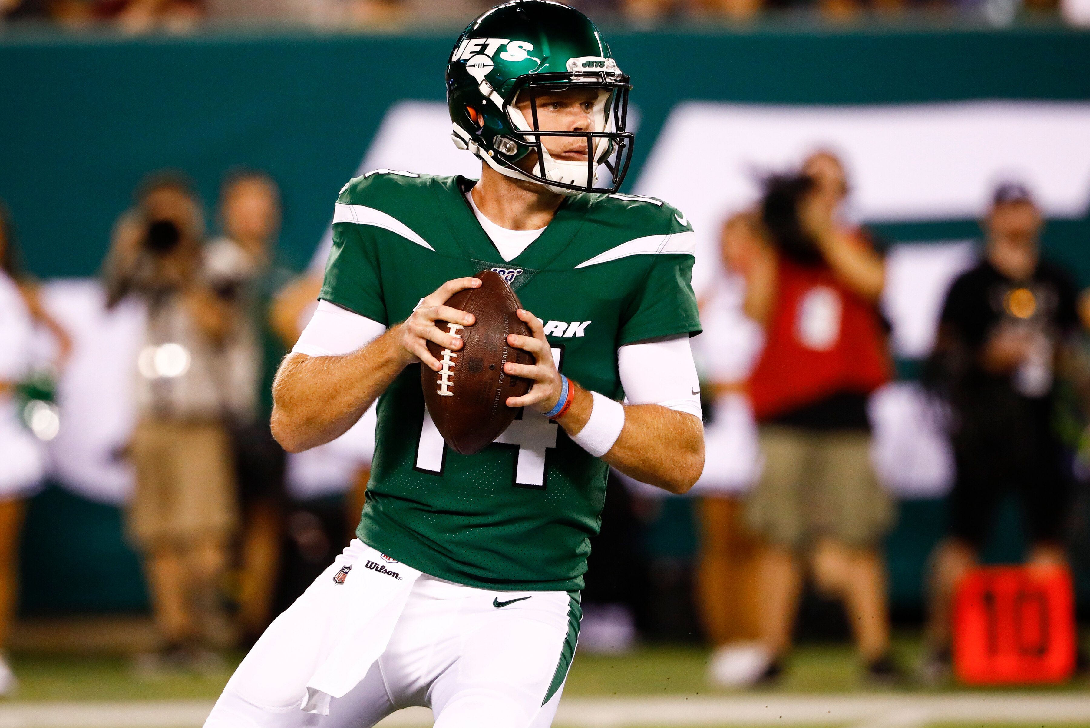 EAST RUTHERFORD, NJ - AUGUST 24:  Sam Darnold #14 of the New York Jets looks to pass during a pre-season game against the New Orleans Saints at MetLife Stadium on August 24, 2019 in East Rutherford, New Jersey. (Photo by Jeff Zelevansky/Getty Images)