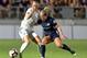 CARY, NORTH CAROLINA - AUGUST 18: Lucia Bronze #2 of Olympique Lyonnais is defended by Kristen Hamilton #23 of North Carolina Courage during the International Champions Cup championship match at WakeMed Soccer Park on August 18, 2019 in Cary, North Carol
