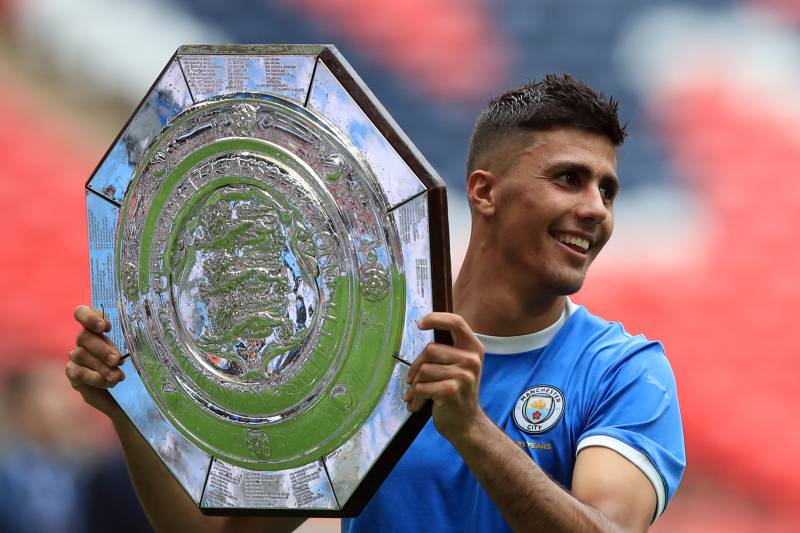 LONDON, ENGLAND - AUGUST 04: Rodri of Manchester City poses with the community shield during the FA Community Shield match between Liverpool and Manchester City at Wembley Stadium on August 4, 2019 in London, England. (Photo by Marc Atkins/Getty Images)