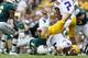 BATON ROUGE, LA - SEPTEMBER 08: Joe Burrow #9 of the LSU Tigers is tackled by Matthew Wright #11 of the Southeastern Louisiana Lions during the first half at Tiger Stadium on September 8, 2018 in Baton Rouge, Louisiana. (Photo by Jonathan Bachman/Getty I