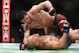 BOSTON, MA - JANUARY 20: Islam Makhachev punches Gleison Tibau in the first round of their Lightweight fight during UFC 220 at TD Garden on January 20, 2018 in Boston, Massachusetts. (Photo by Mike Lawrie/Getty Images)