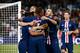 PARIS, FRANCE - AUGUST 11: Kylian Mbappe #7 of Paris Saint-Germain celebrates his goal with Juan Bernat Velasco #14, Edinson Cavani #9 and Pablo Sarabia #19 of Paris Saint-Germain during the Ligue 1 match between Paris Saint-Germain and Nimes Olympique at