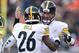 CINCINNATI, OH - DECEMBER 7: Ben Roethlisberger #7 of the Pittsburgh Steelers congratulates Le'Veon Bell #26 of the Pittsburgh Steelers after scoring a touchdown during the fourth quarter of the game against the Cincinnati Bengals at Paul Brown Stadium o