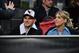 MILAN, ITALY - FEBRUARY 21: Mauro Icardi (L) and Wanda Nara look on in VIP standing during the UEFA Europa League Round of 32 Second Leg match between FC Internazionale and SK Rapid Wien at San Siro on February 21, 2019 in Milan, Italy. (Photo by Tullio P