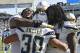 CARSON, CA - SEPTEMBER 08: Running back Austin Ekeler #30 of the Los Angeles Chargers is congratulated by Justin Jones #93 and Melvin Ingram #54 after scoring the winning touchdown in overtime against Indianapolis Colts at Dignity Health Sports Park on Se