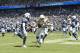 CARSON, CA - SEPTEMBER 08: Running back Austin Ekeler #30 of the Los Angeles Chargers scores a touchdown against middle linebacker Anthony Walker #50 of the Indianapolis Colts during the first half at Dignity Health Sports Park on September 8, 2019 in Car