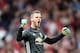 MANCHESTER, ENGLAND - AUGUST 11: David De Gea of Manchester United celebrates after his teammate Marcus Rashford of Manchester United scored their teams third goal during the Premier League match between Manchester United and Chelsea FC at Old Trafford on