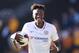 WOLVERHAMPTON, ENGLAND - SEPTEMBER 14: Tammy Abraham of Chelsea holds the match ball after scoring a hat trick during the Premier League match between Wolverhampton Wanderers and Chelsea FC at Molineux on September 14, 2019 in Wolverhampton, United Kingdo