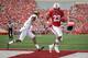 MADISON, WISCONSIN - SEPTEMBER 07: Jonathan Taylor #23 of the Wisconsin Badgers scores a touchdown past Norman Anderson #16 of the Central Michigan Chippewas in the first quarter at Camp Randall Stadium on September 07, 2019 in Madison, Wisconsin. (Photo