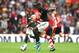 SOUTHAMPTON, ENGLAND - AUGUST 31: Paul Pogba of Manchester United is challenged by Oriol Romeu of Southampton during the Premier League match between Southampton FC and Manchester United at St Mary's Stadium on August 31, 2019 in Southampton, United Kingd