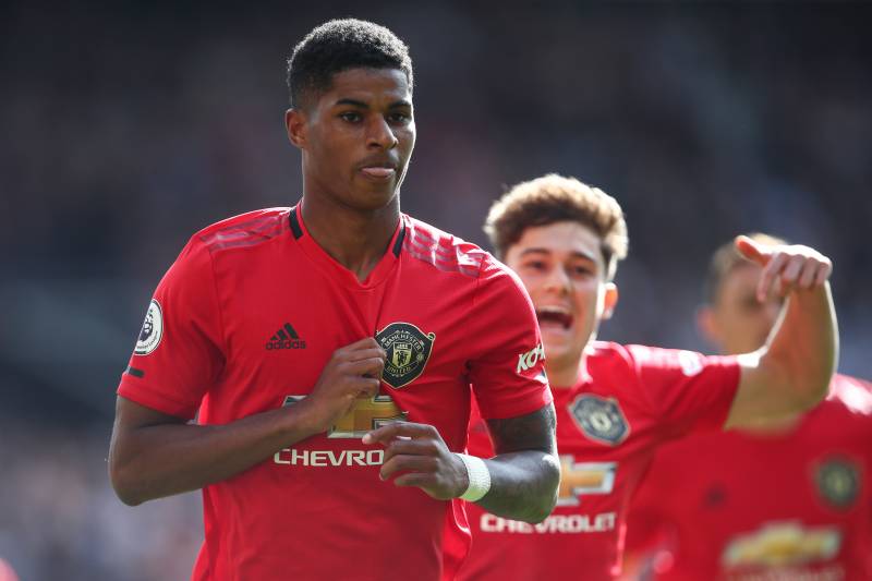 MANCHESTER, ENGLAND - SEPTEMBER 14: Marcus Rashford of Manchester United celebrates after scoring a goal to make it 1-0 during the Premier League match between Manchester United and Leicester City at Old Trafford on September 14, 2019 in Manchester, Unite
