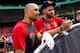 BOSTON, MA - JULY 28: Mookie Betts #50 talks with J.D. Martinez #28 of the Boston Red Sox before a game against the New York Yankees on July 28, 2019 at Fenway Park in Boston, Massachusetts. (Photo by Billie Weiss/Boston Red Sox/Getty Images)