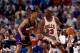 CHICAGO - JUNE 16: Michael Jordan #23 of the Chicago Bulls posts up against Kevin Johnson #7 of the Phoenix Suns in Game Four of the 1993 NBA Finals on June 16, 1993 at the Chicago Stadium in Chicago, Illinois. The Bulls won 111-105. NOTE TO USER: User