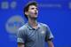 WUHAN, CHINA - SEPTEMBER 28: Dominic Thiem of Austria reacts during the men's exhibition match against Fabio Fognini of Italy on Day 7 of 2019 Dongfeng Motor Wuhan Open at Optics Valley International Tennis Center on September 28, 2019 in Wuhan, China.