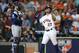 HOUSTON, TEXAS - OCTOBER 10: Jose Altuve #27 of the Houston Astros hits a solo home run against the Tampa Bay Rays during the eighth inning in game five of the American League Division Series at Minute Maid Park on October 10, 2019 in Houston, Texas. (Ph