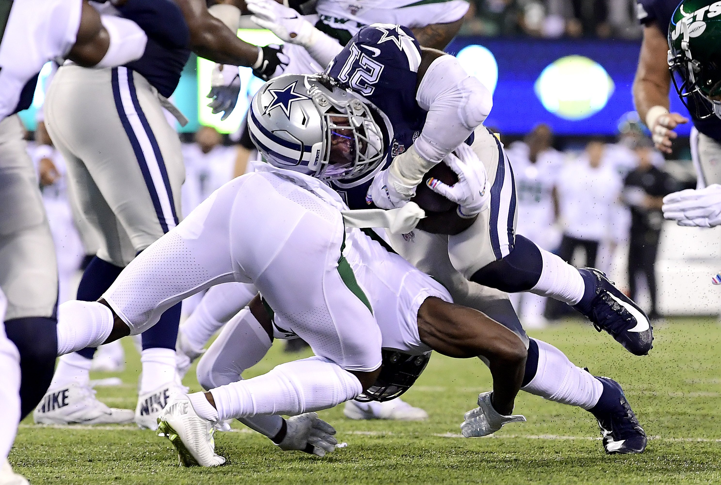 Elliott, Cowboys power past Seahawks for 24-22 wild-card win